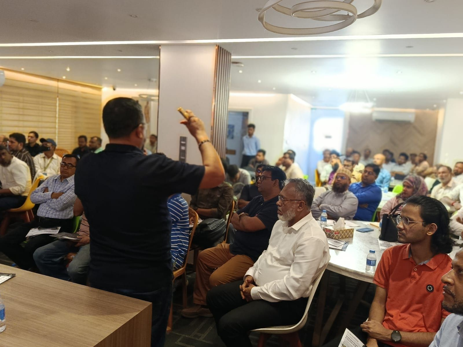 Md. Nazrul Islam leading a discussion with participants during the DPP awareness and readiness training session.
